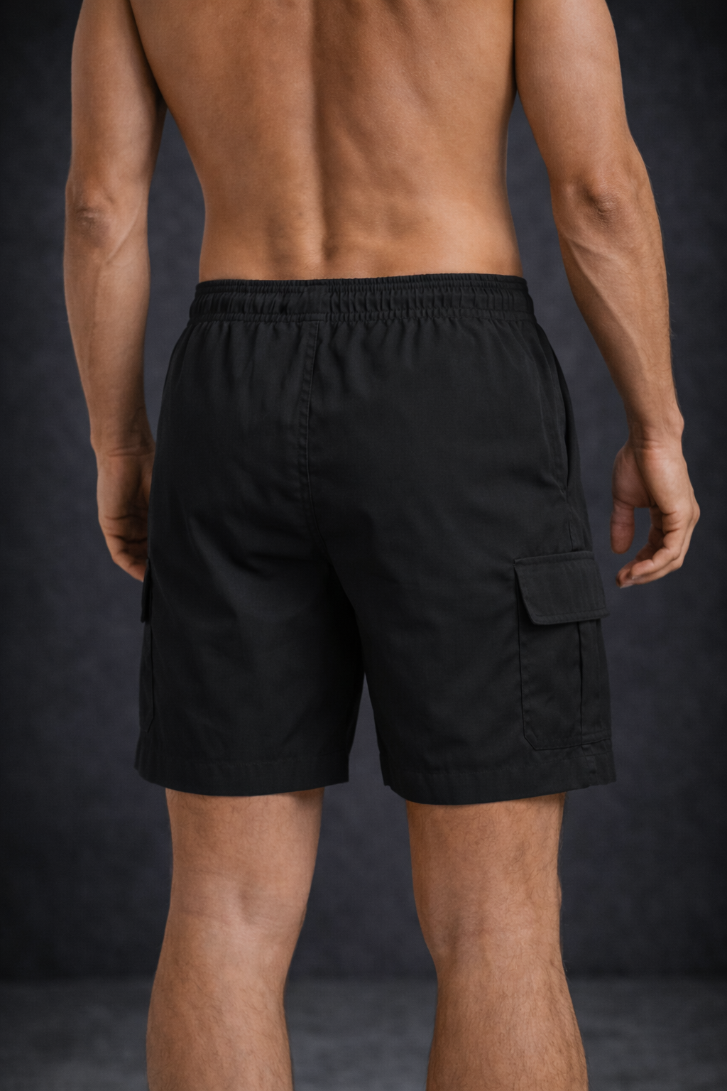 Man wearing black summer shorts